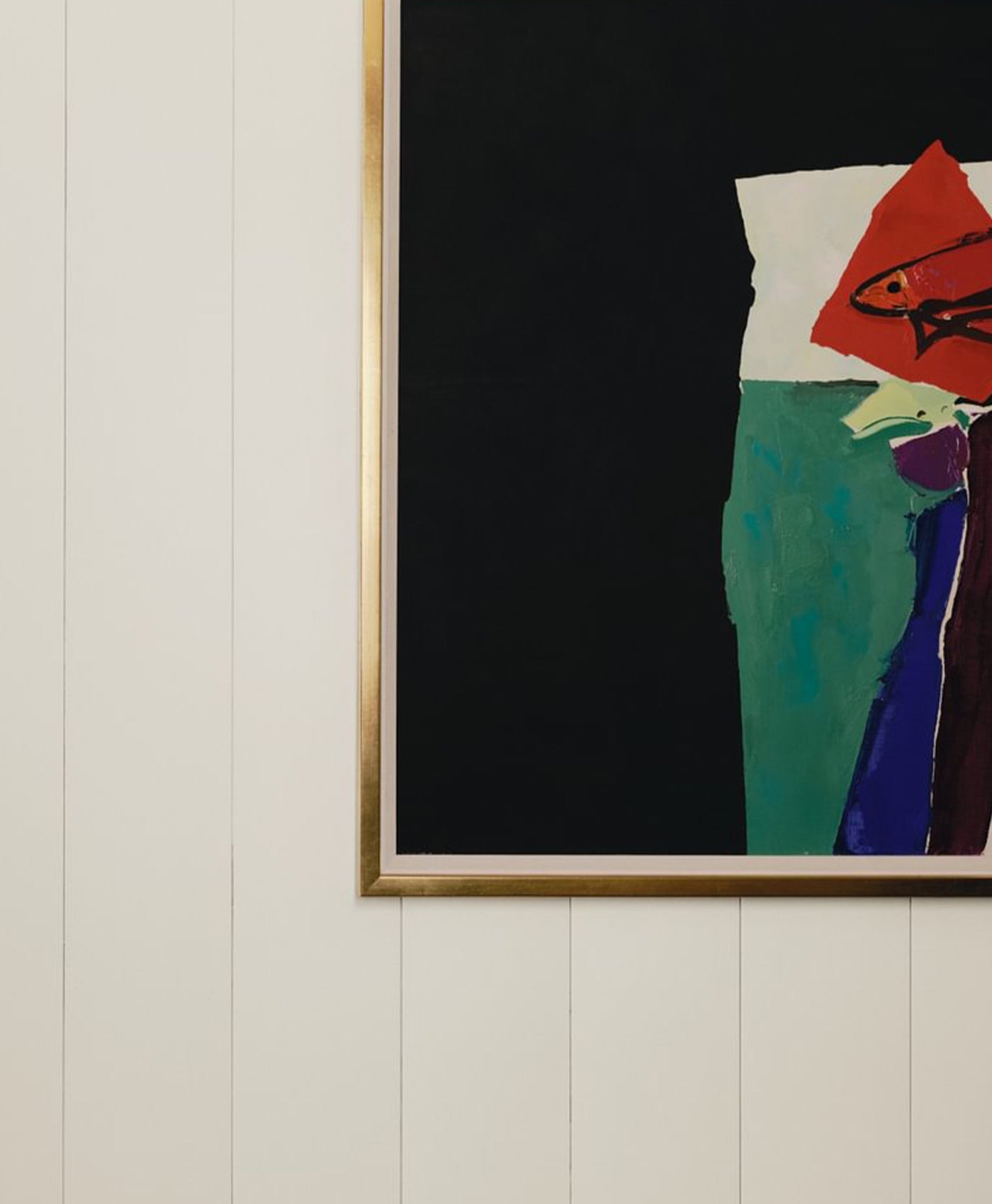 Abstract artwork on off-white panelled wall