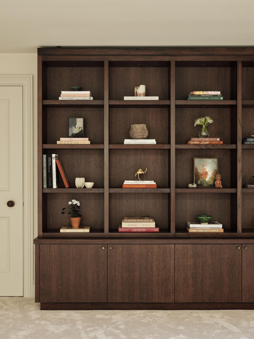 Crafted in straight-grain oak and stained in Mylands Walnut, this bespoke joinery brings warmth and a grounded elegance to the space. Open shelving above for display, concealed storage below.Discover more from Mon.jpg__PID:57baef3d-7fea-41eb-a054-d0da750ba698
