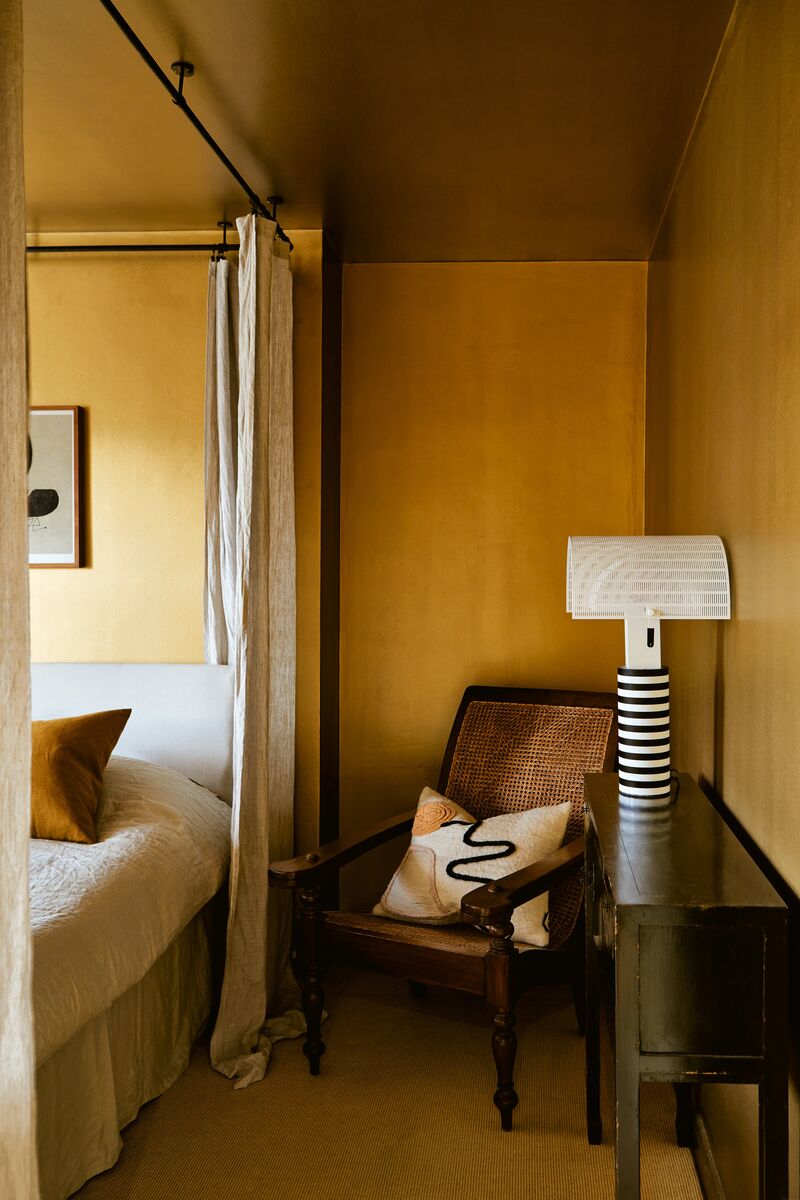 Bedroom walls and ceiling painted in Mylands FTT001 rich gold.