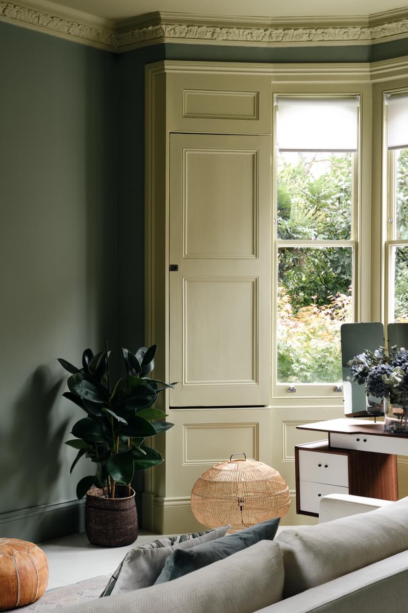 Living room walls painted in Mylands Serpentine™ No.192 and woodwork painted in Mylands London Plane™ No. 200.