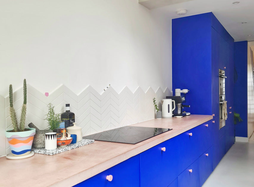 Navy Blue kitchen cabinetry painted with Mylands FTT-018